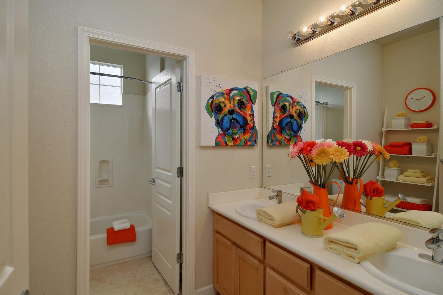 4126 Tobin Circle Santa Clara, CA 95054 - Photo 11 of 16 a bathroom with a sink mirror and vanity