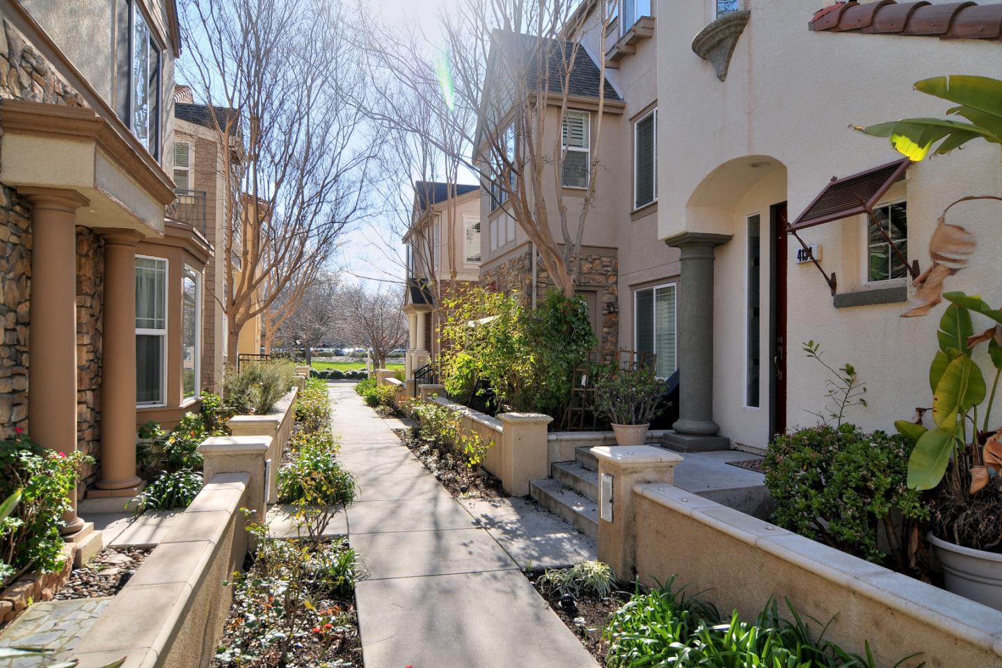 4126 Tobin Circle Santa Clara, CA 95054 - Photo 2 of 16 a view of a building with potted plants