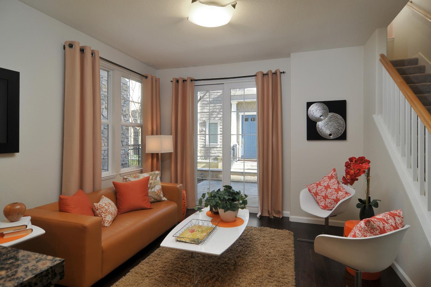 4126 Tobin Circle Santa Clara, CA 95054 - Photo 4 of 16 a living room with furniture and a floor to ceiling window