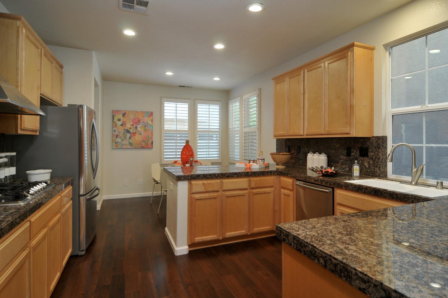 4126 Tobin Circle Santa Clara, CA 95054 - Photo 5 of 16 a kitchen with stainless steel appliances granite countertop a sink stove and refrigerator