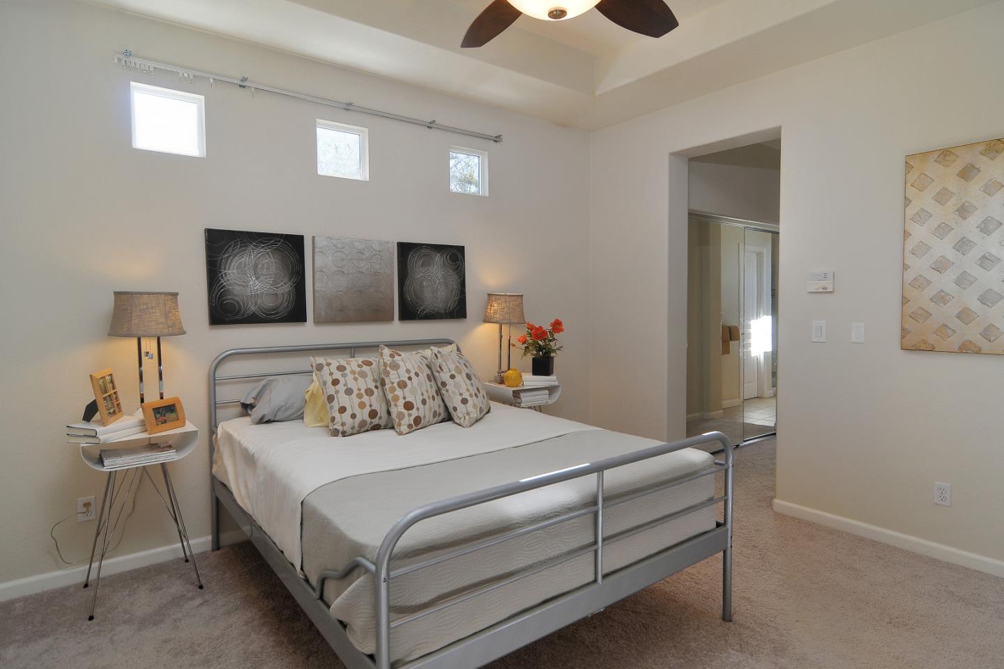 4126 Tobin Circle Santa Clara, CA 95054 - Photo 10 of 16 a bedroom with a bed and a lamp on table