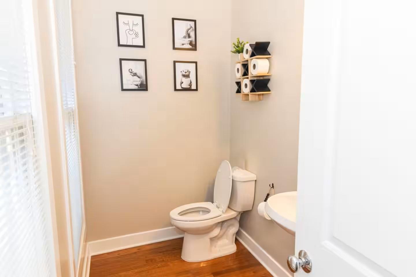 24 South Regester Street Baltimore, MD 21231 - Photo 10 of 44 a white toilet sitting next to a white wall