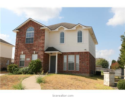 2400 Pintail Loop College Station, TX 77845 - Photo 1 of 1 a front view of a house with a yard