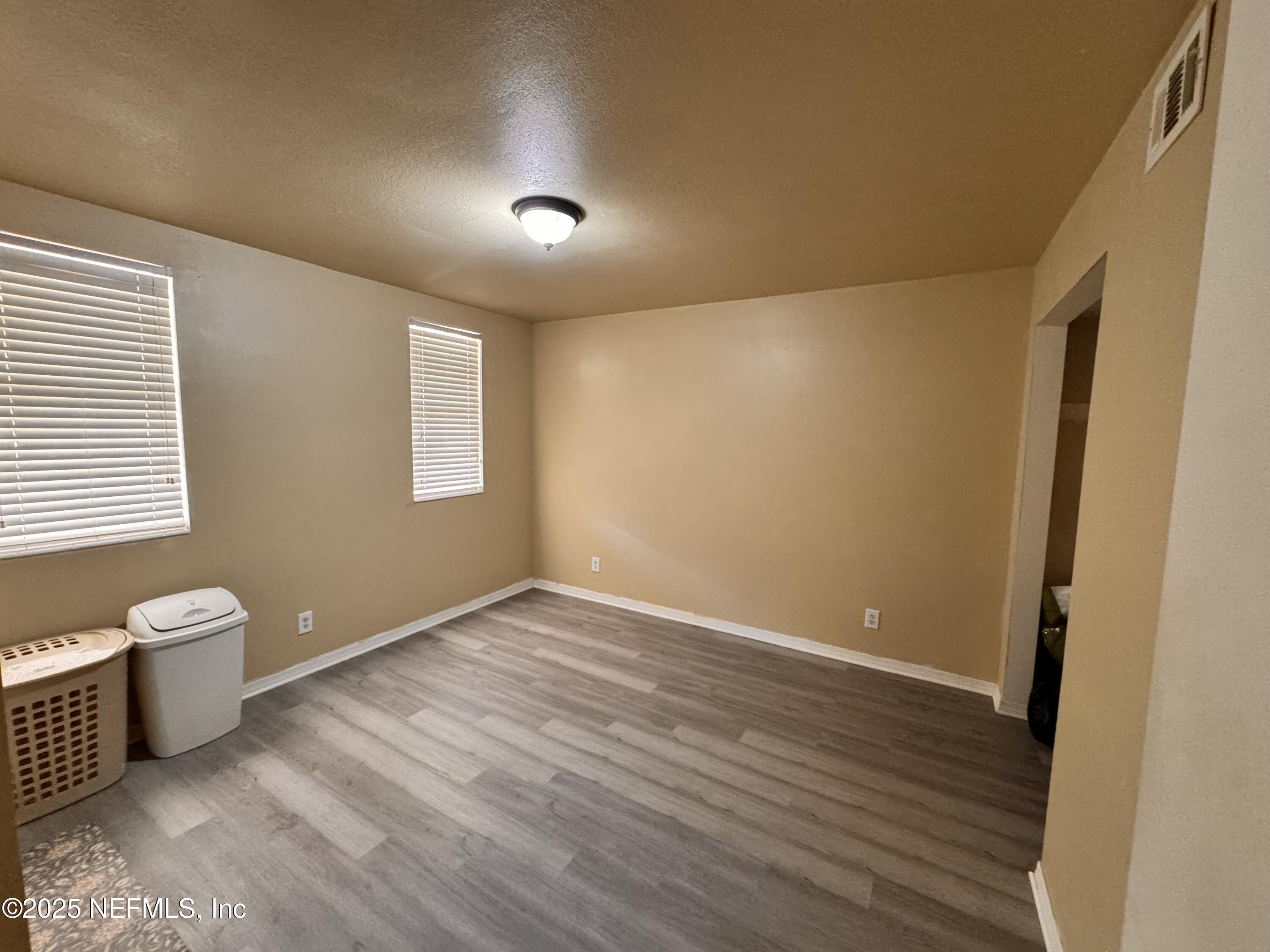 1707 El Prado Road, Unit 3 Jacksonville, FL 32216 - Photo 13 of 24 a view of a room with wooden floor and window