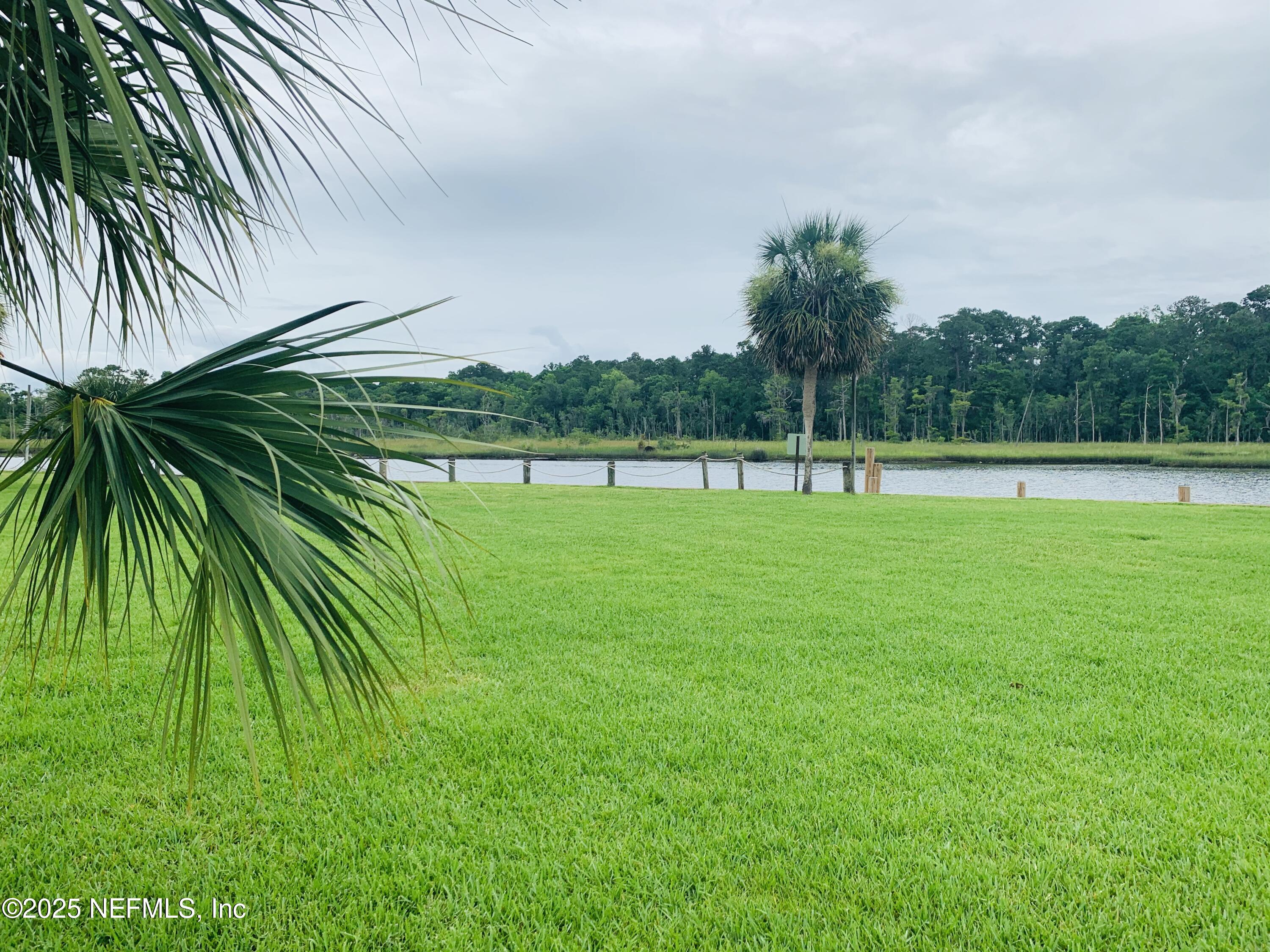 1707 El Prado Road, Unit 3 Jacksonville, FL 32216 - Photo 24 of 24 a view of outdoor space with a garden and entertaining space