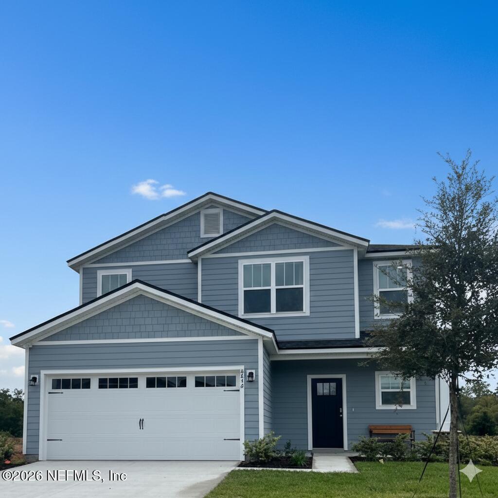 8614 Crystalline Lane Jacksonville, FL 32221 - Photo 1 of 20 a front view of a house with a yard