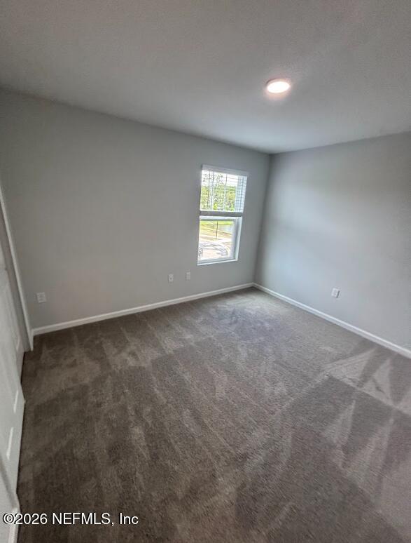 8614 Crystalline Lane Jacksonville, FL 32221 - Photo 14 of 20 an empty room with a window