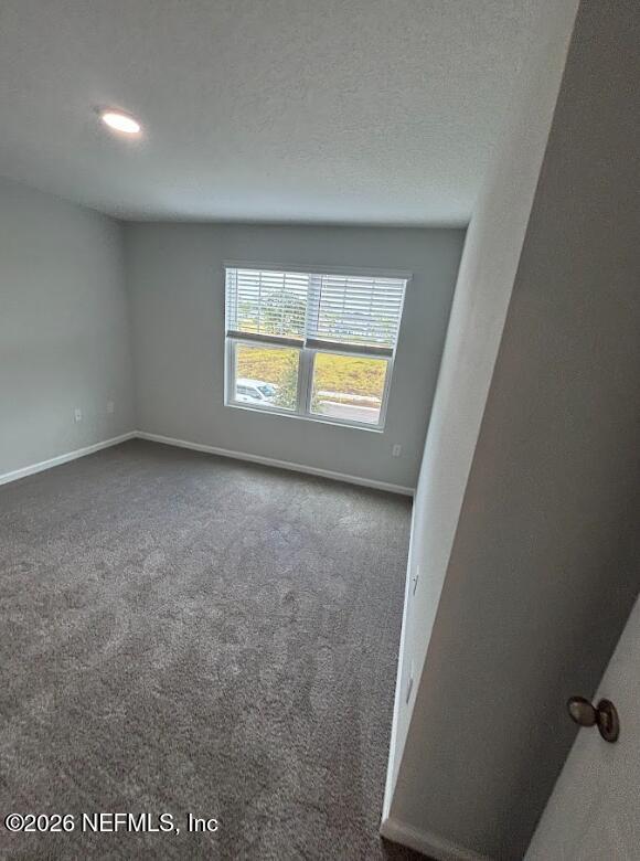 8614 Crystalline Lane Jacksonville, FL 32221 - Photo 16 of 20 an empty room with a window