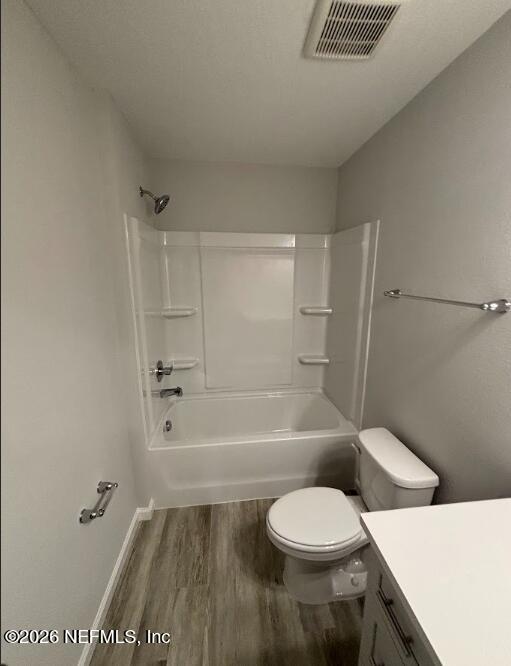 8614 Crystalline Lane Jacksonville, FL 32221 - Photo 18 of 20 a bathroom with a toilet and a bath tub