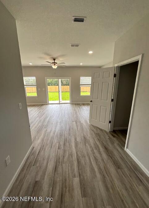 8614 Crystalline Lane Jacksonville, FL 32221 - Photo 2 of 20 wooden floor in an empty room with a window