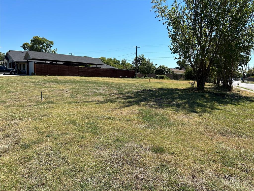 3208 Lockmoor Lane Dallas, TX 75220 - Photo 2 of 3 a view of a lake with houses