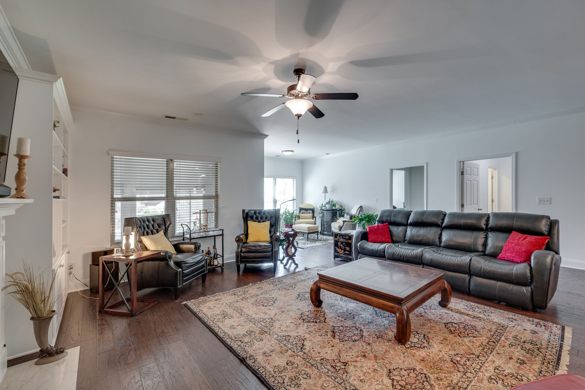 5012 Rizer Point Drive Franklin, TN 37069 - Photo 14 of 38 a living room with furniture a rug and a chandelier