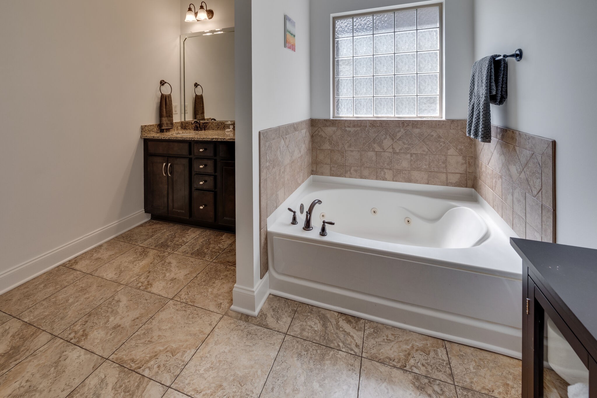5012 Rizer Point Drive Franklin, TN 37069 - Photo 21 of 38 a bathroom with a bathtub and a sink