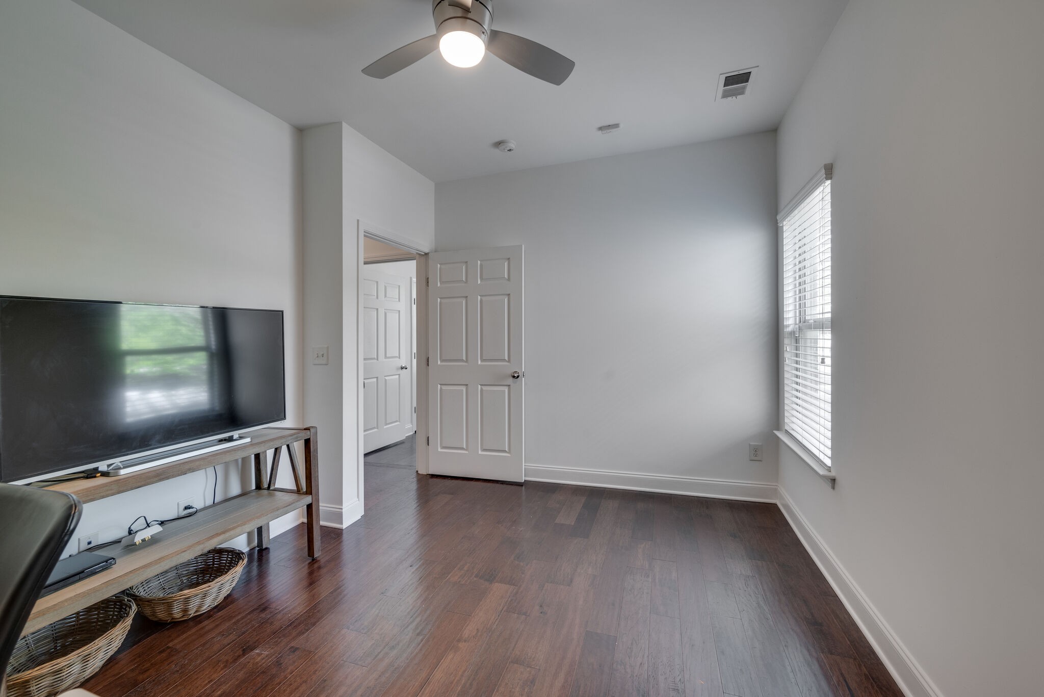 5012 Rizer Point Drive Franklin, TN 37069 - Photo 25 of 38 an empty room with wooden floor and windows