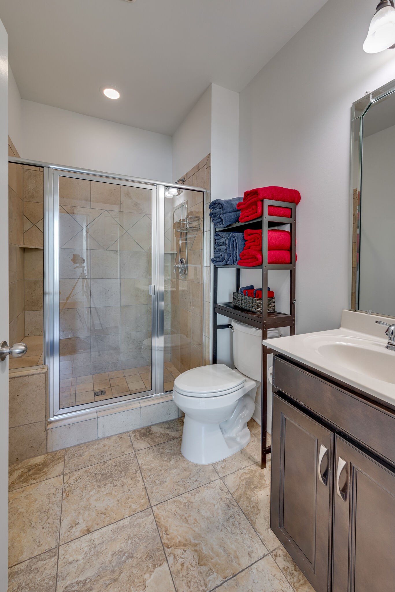 5012 Rizer Point Drive Franklin, TN 37069 - Photo 26 of 38 a bathroom with a toilet sink vanity and shower