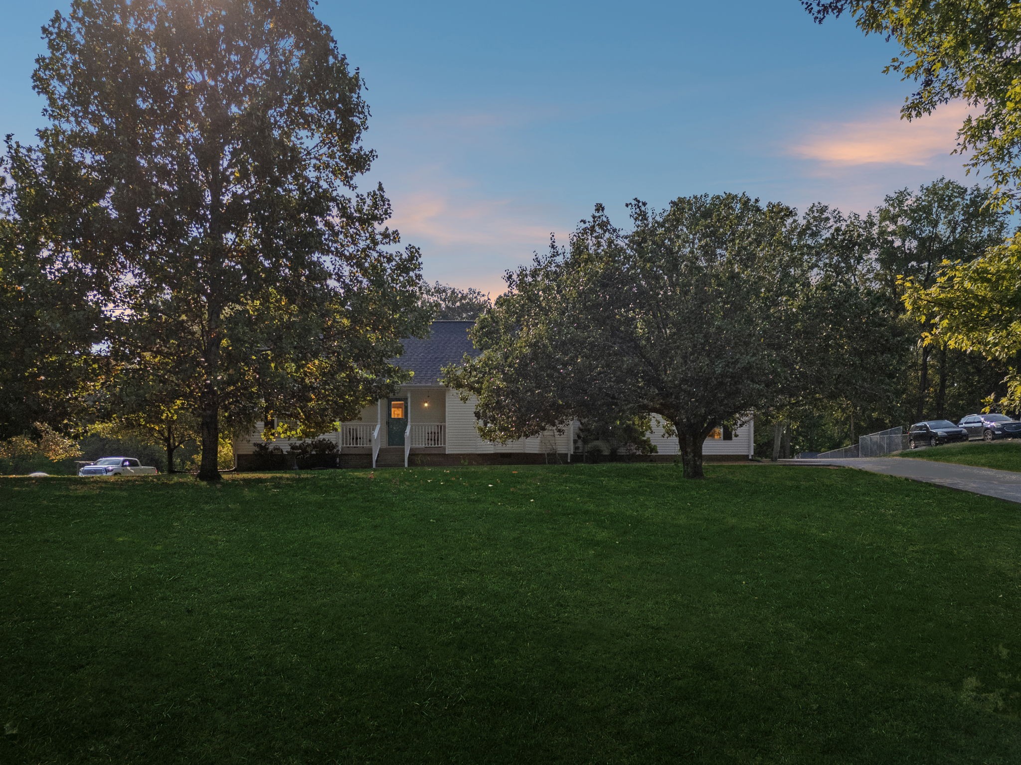 a view of a trees with a big yard