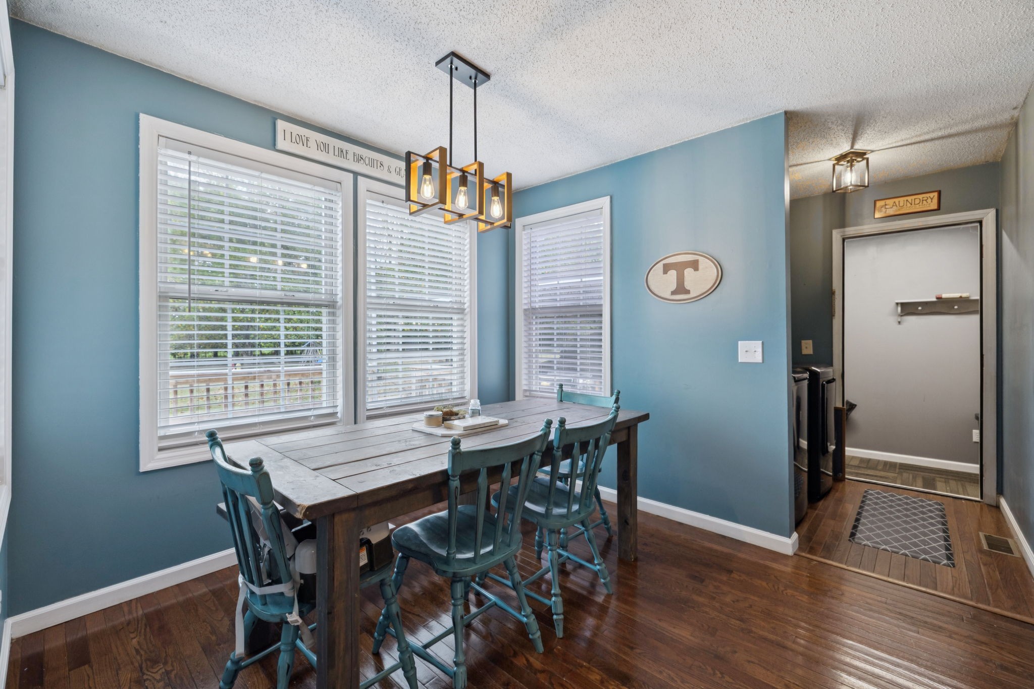1016 Keystone Drive Pleasant View, TN 37146 - Photo 15 of 33 a view of a dining room with furniture window and wooden floor
