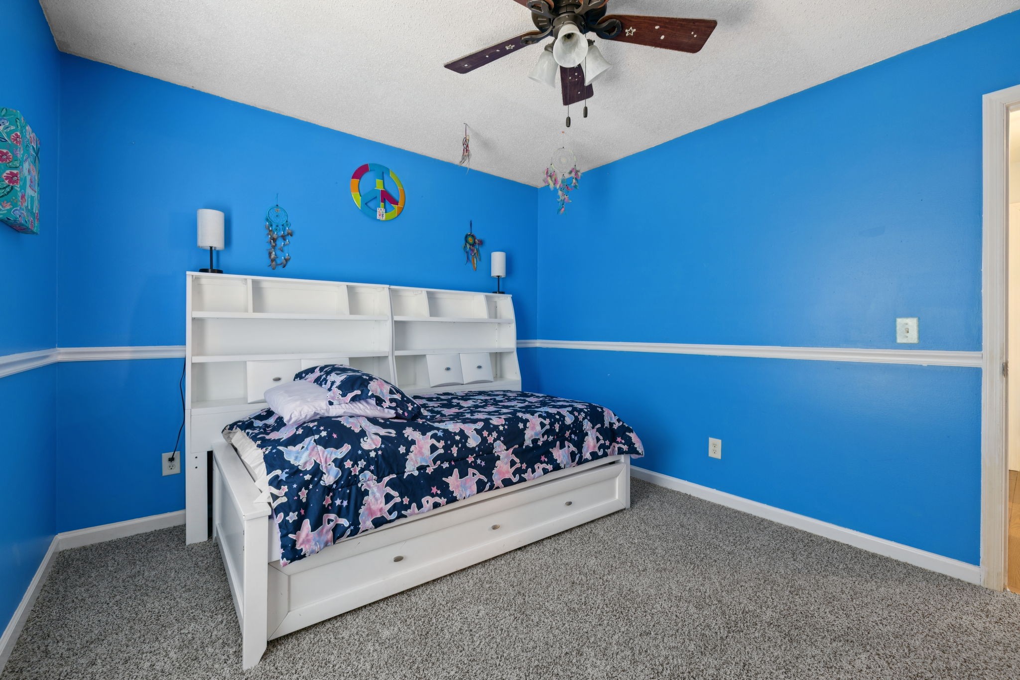 1016 Keystone Drive Pleasant View, TN 37146 - Photo 18 of 33 a bed room with a bed and a chandelier