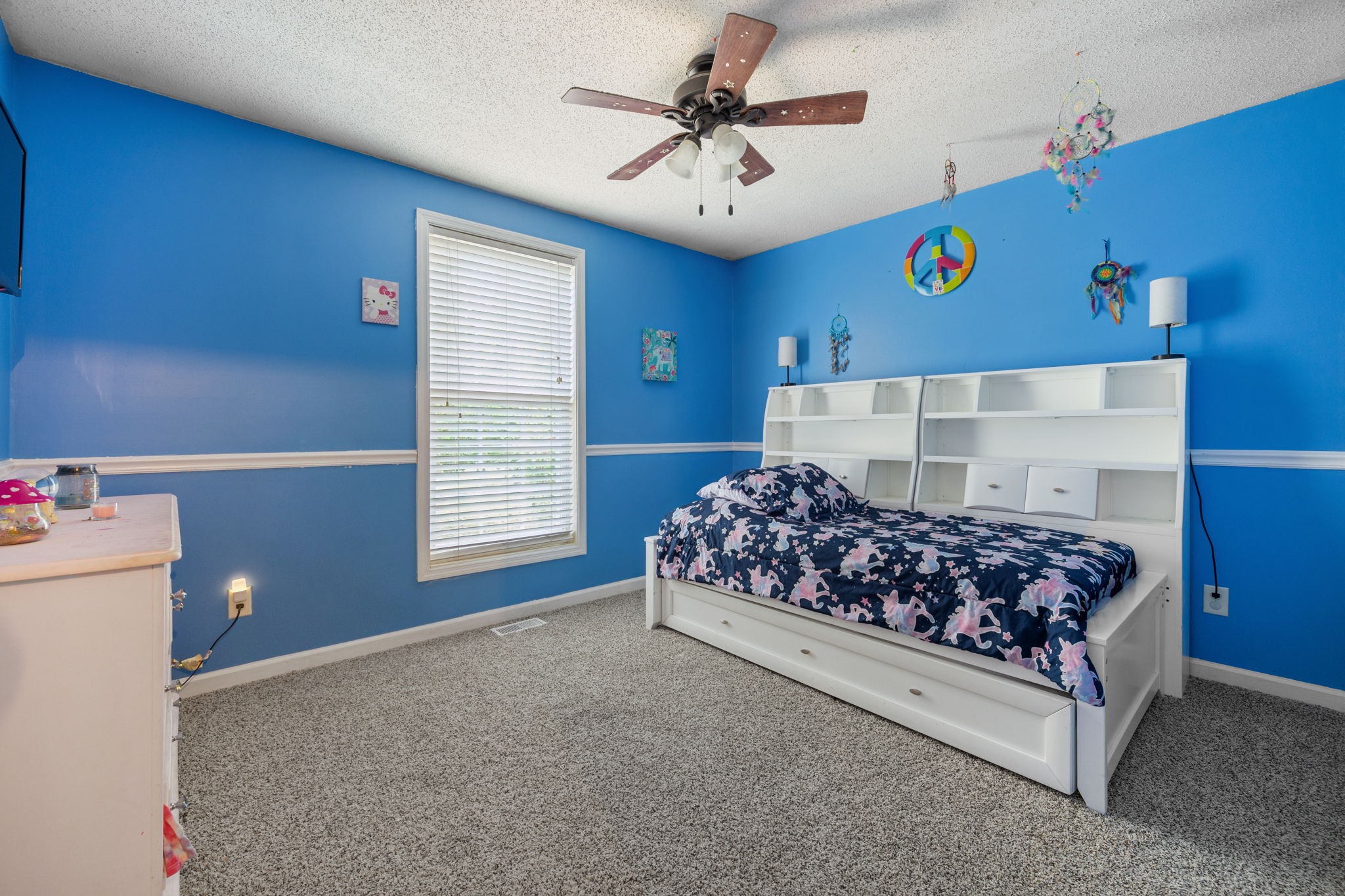 1016 Keystone Drive Pleasant View, TN 37146 - Photo 19 of 33 a bed room with a bed and a baby crib