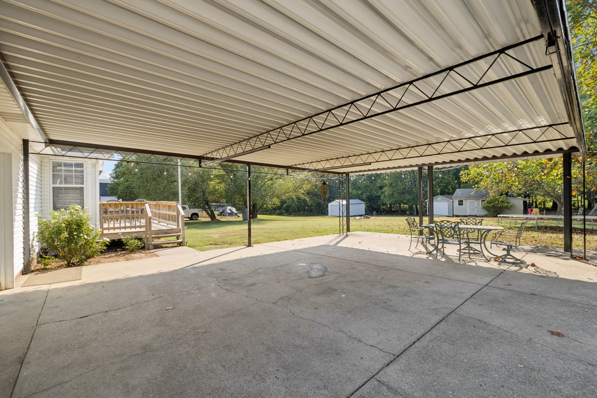 1016 Keystone Drive Pleasant View, TN 37146 - Photo 24 of 33 a view of a house with backyard porch and sitting area