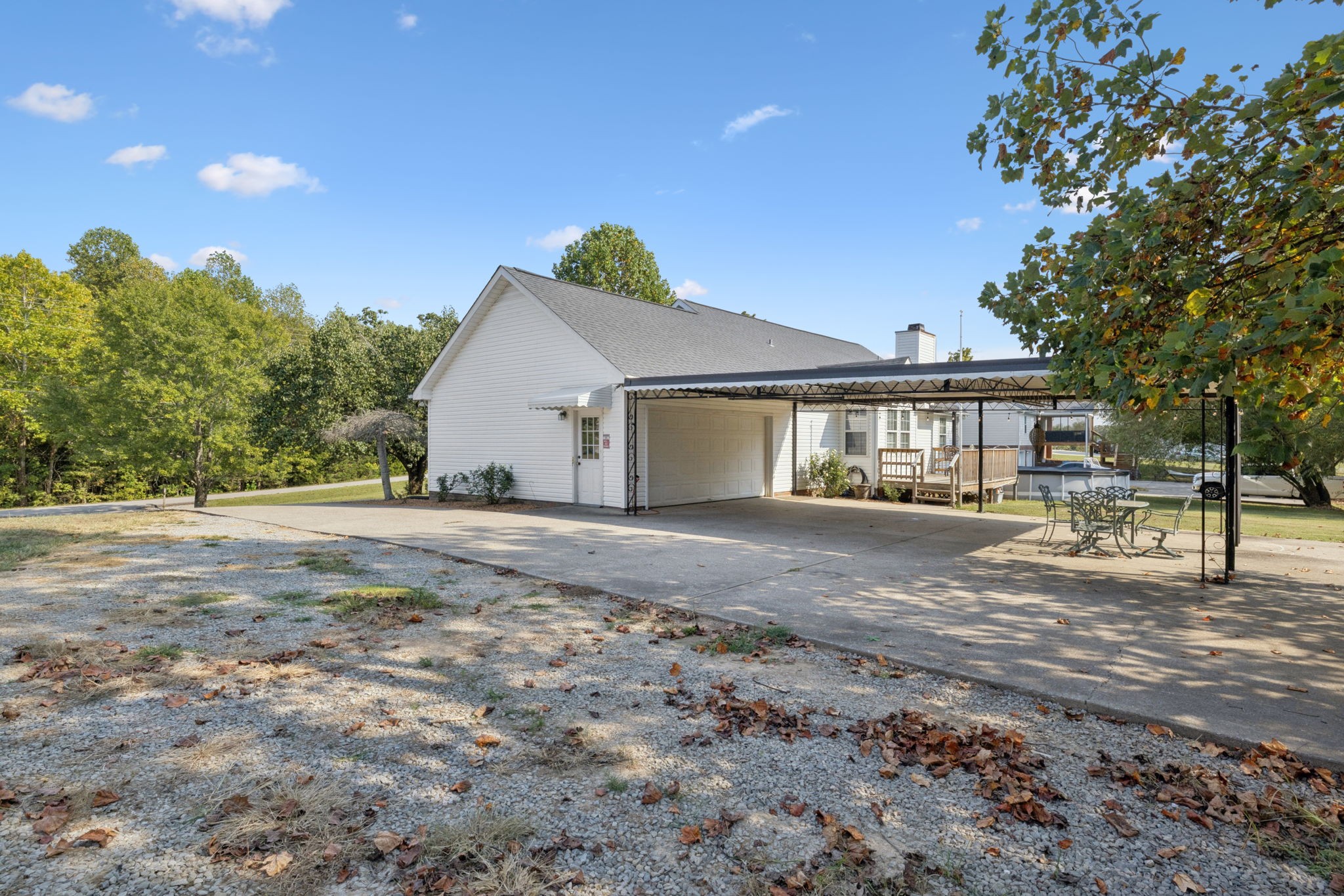 1016 Keystone Drive Pleasant View, TN 37146 - Photo 26 of 33 a view of a house with a yard and sitting area