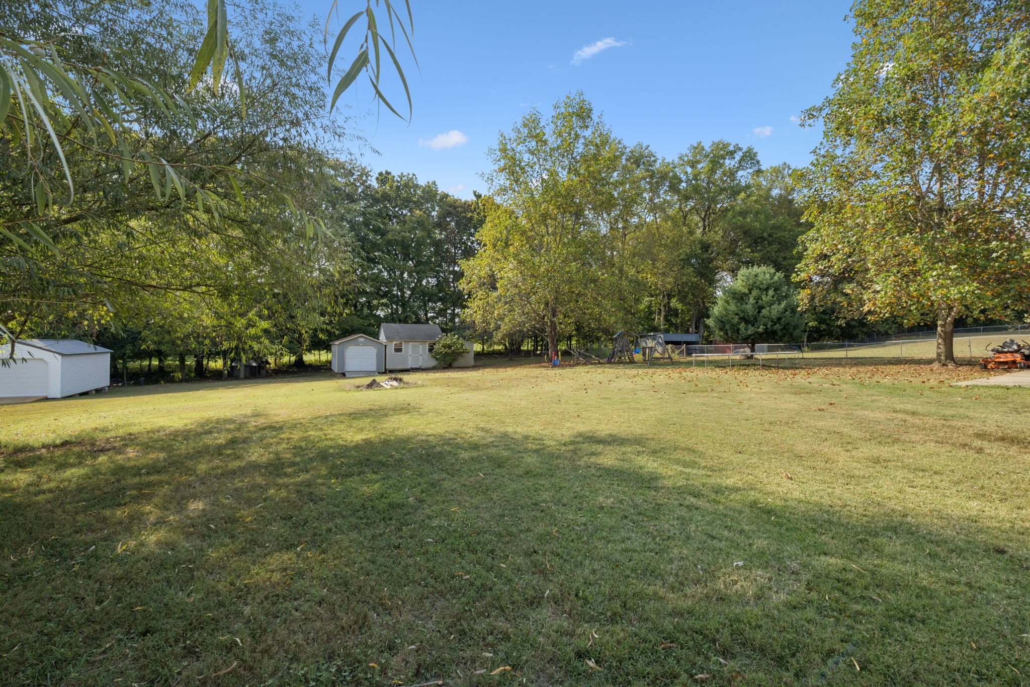 1016 Keystone Drive Pleasant View, TN 37146 - Photo 27 of 33 a view of outdoor space with deck and trees