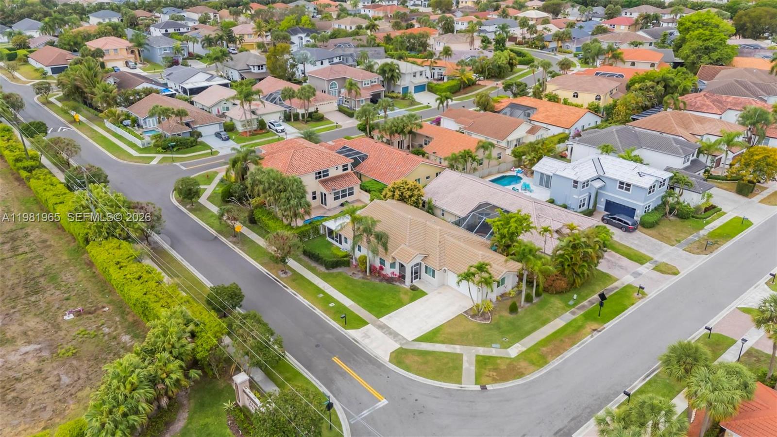 11030 Harbour Springs Circle Boca Raton, FL 33428 - Photo 30 of 39 an aerial view of residential houses with outdoor space