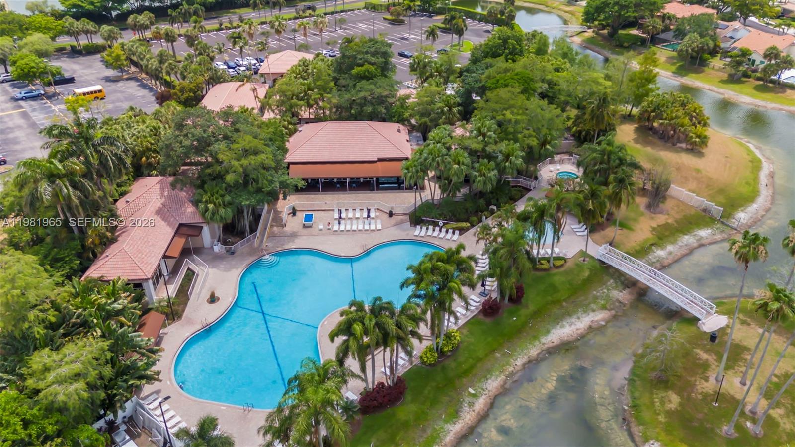 11030 Harbour Springs Circle Boca Raton, FL 33428 - Photo 37 of 39 an aerial view of a house with a garden