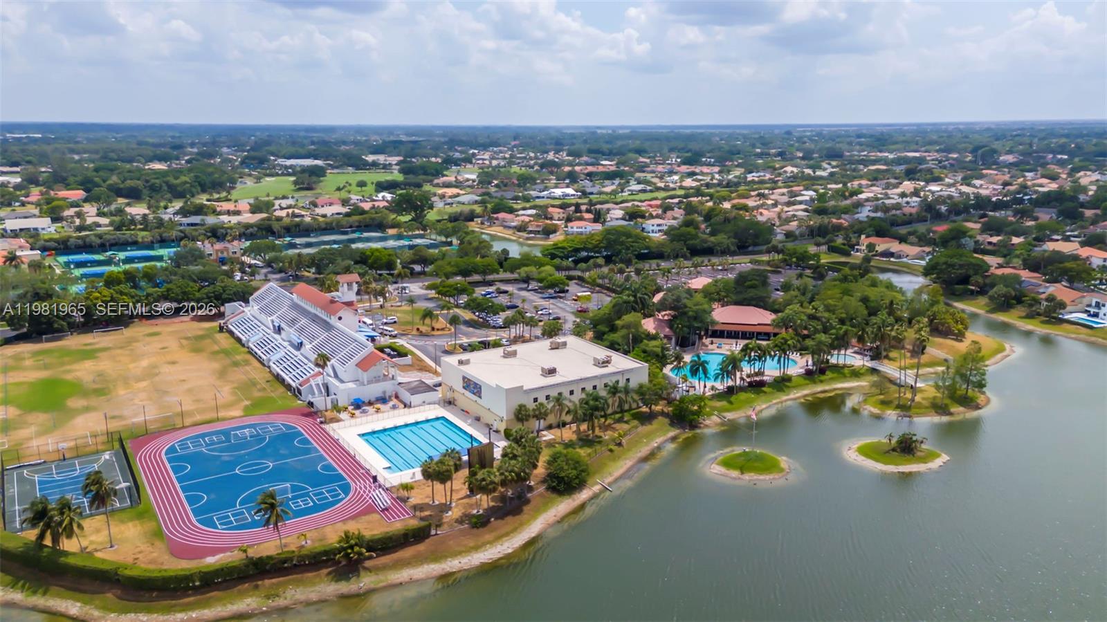 11030 Harbour Springs Circle Boca Raton, FL 33428 - Photo 39 of 39 an aerial view of residential houses with outdoor space