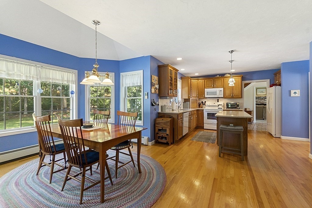 71 Easter Brook Road Lunenburg, MA 01462 - Photo 11 of 33 a view of a dining room with furniture window and wooden floor