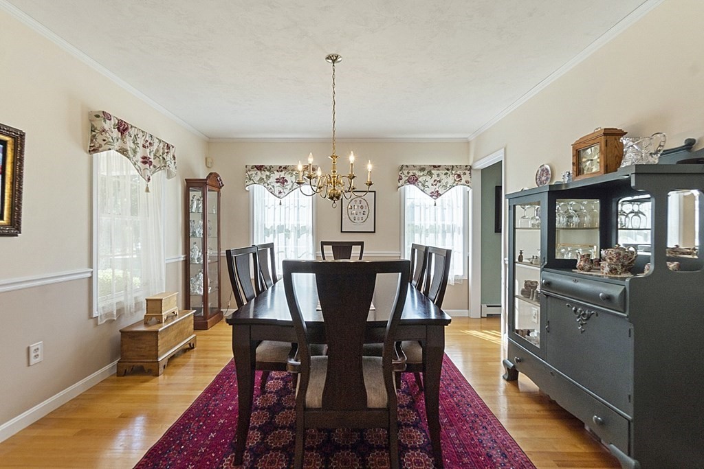 71 Easter Brook Road Lunenburg, MA 01462 - Photo 14 of 33 a view of a dining room with furniture window and wooden floor