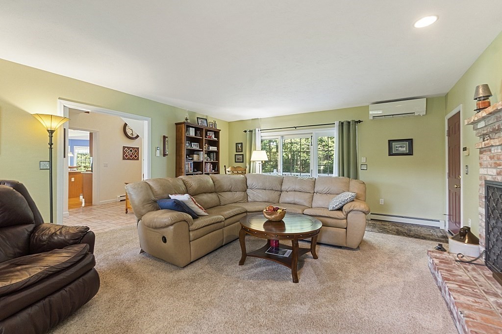71 Easter Brook Road Lunenburg, MA 01462 - Photo 16 of 33 a living room with furniture and a large window