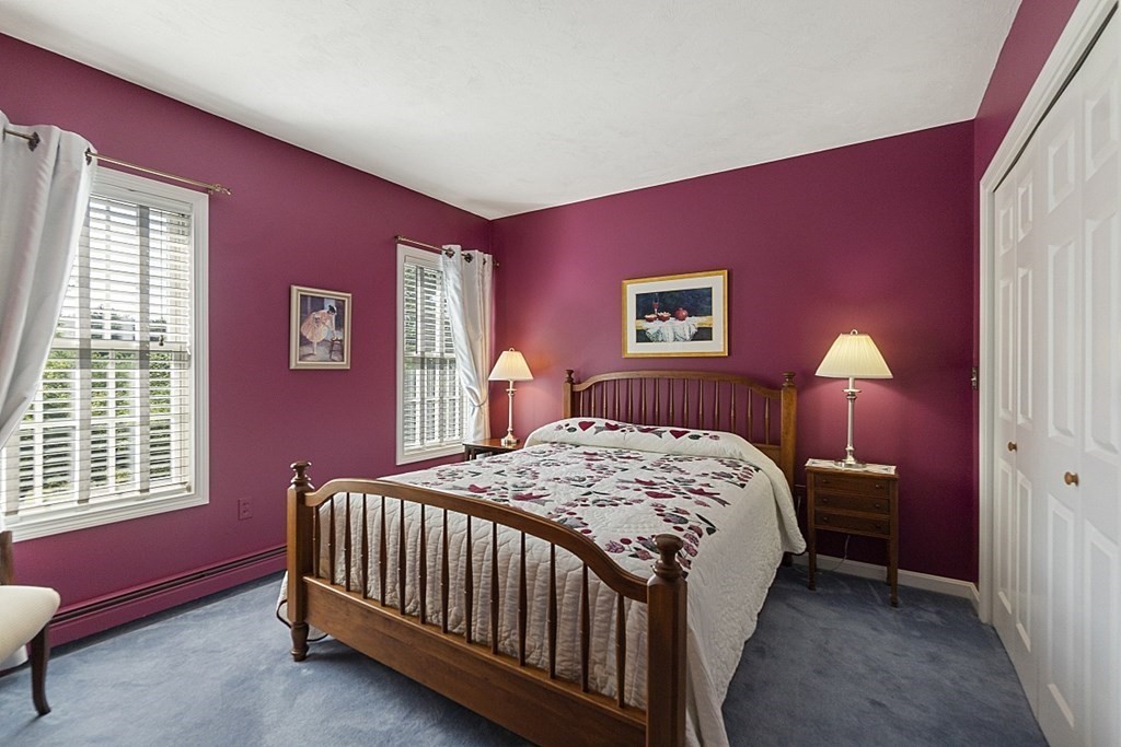 71 Easter Brook Road Lunenburg, MA 01462 - Photo 20 of 33 a bedroom with a bed and a lamp