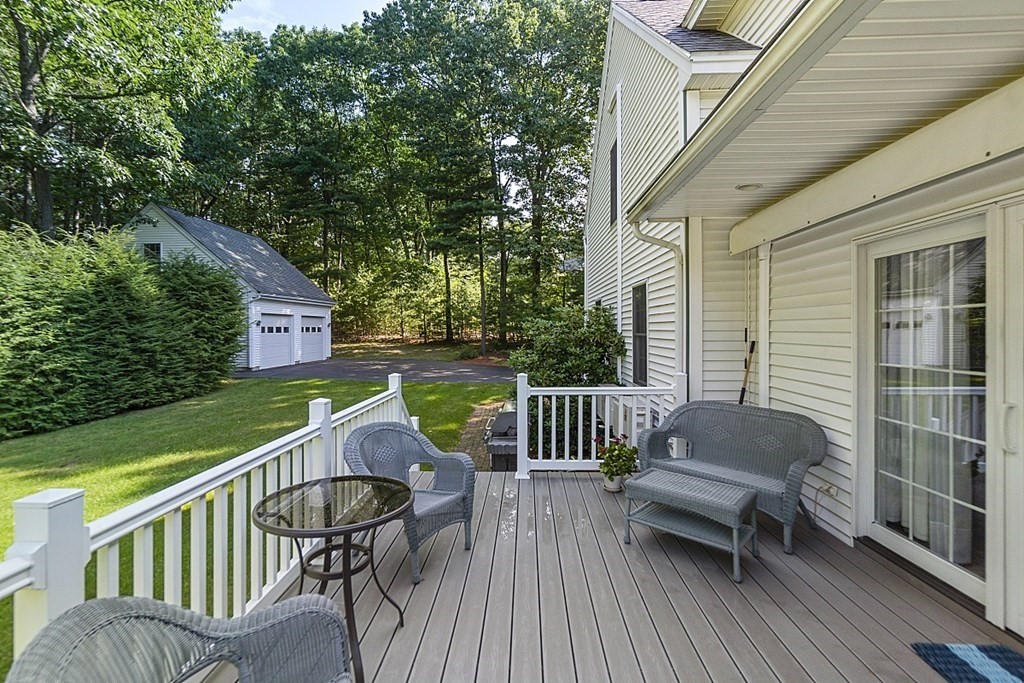 71 Easter Brook Road Lunenburg, MA 01462 - Photo 7 of 33 a view of a patio with a table and chairs