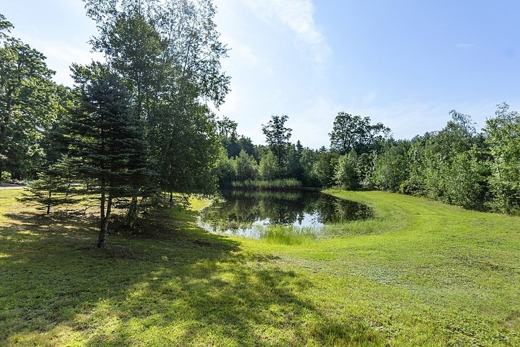 71 Easter Brook Road Lunenburg, MA 01462 - Photo 10 of 33 a view of lake with green space