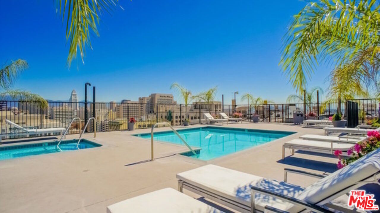312 West 5th Street, Unit 606 Los Angeles, CA 90013 - Photo 16 of 18 a view of a patio with swimming pool