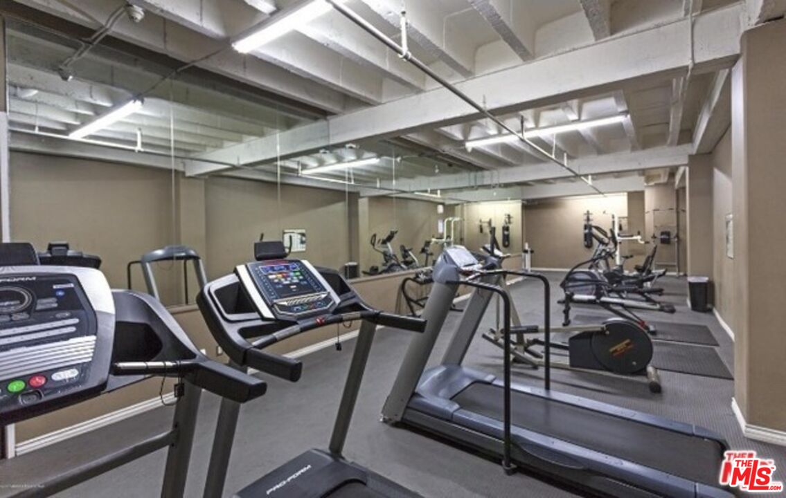 312 West 5th Street, Unit 606 Los Angeles, CA 90013 - Photo 17 of 18 a view of a room with gym equipment