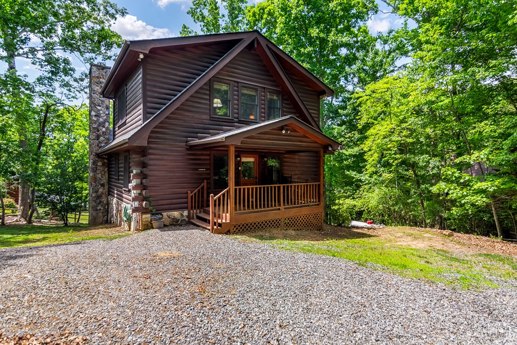 22 Waterloon Trail Morganton, GA 30560 - Photo 26 of 71 a view of a house with backyard and trees