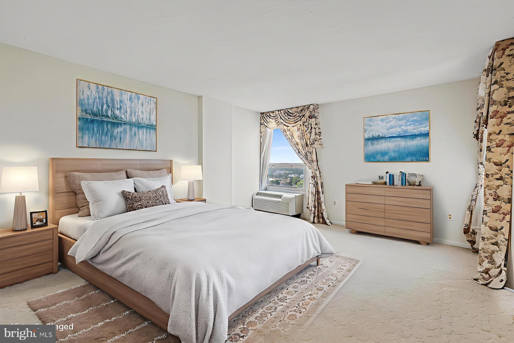 205 East Joppa Road, Unit 1606 Towson, MD 21286 - Photo 13 of 33 a bedroom with a bed and a window