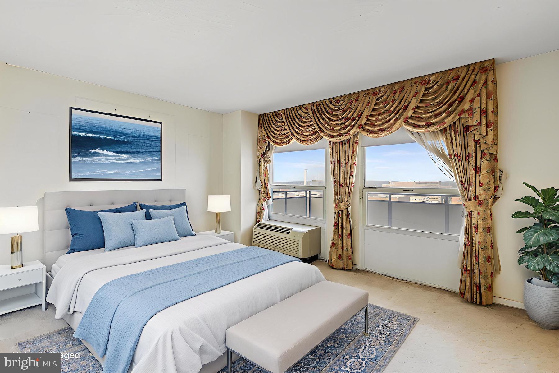 205 East Joppa Road, Unit 1606 Towson, MD 21286 - Photo 18 of 33 a bedroom with a bed and a window