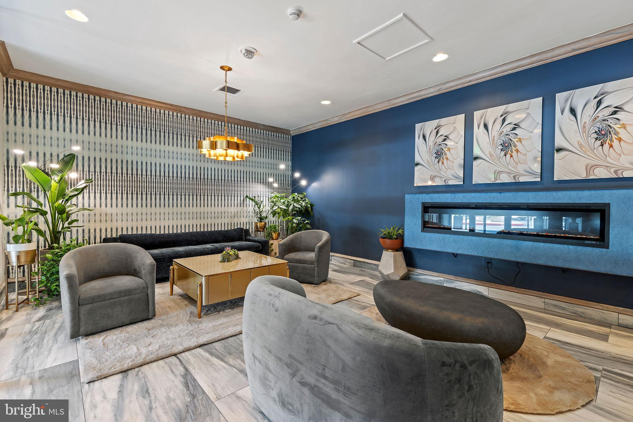 205 East Joppa Road, Unit 1606 Towson, MD 21286 - Photo 28 of 33 a living room with furniture and a potted plant