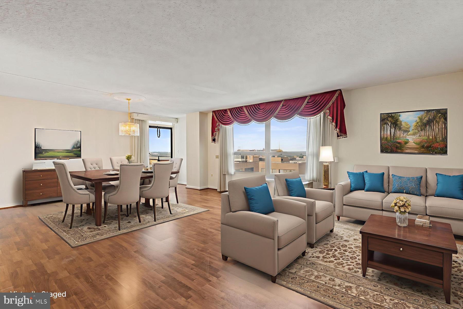 205 East Joppa Road, Unit 1606 Towson, MD 21286 - Photo 6 of 33 a living room with furniture dining area and a large window