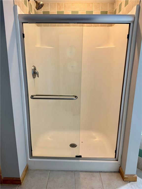30 Shallowford Road Northeast Kennesaw, GA 30144 - Photo 22 of 41 a bathroom with a glass shower door