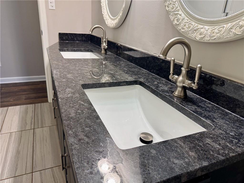 30 Shallowford Road Northeast Kennesaw, GA 30144 - Photo 28 of 41 a close view of sink and tap