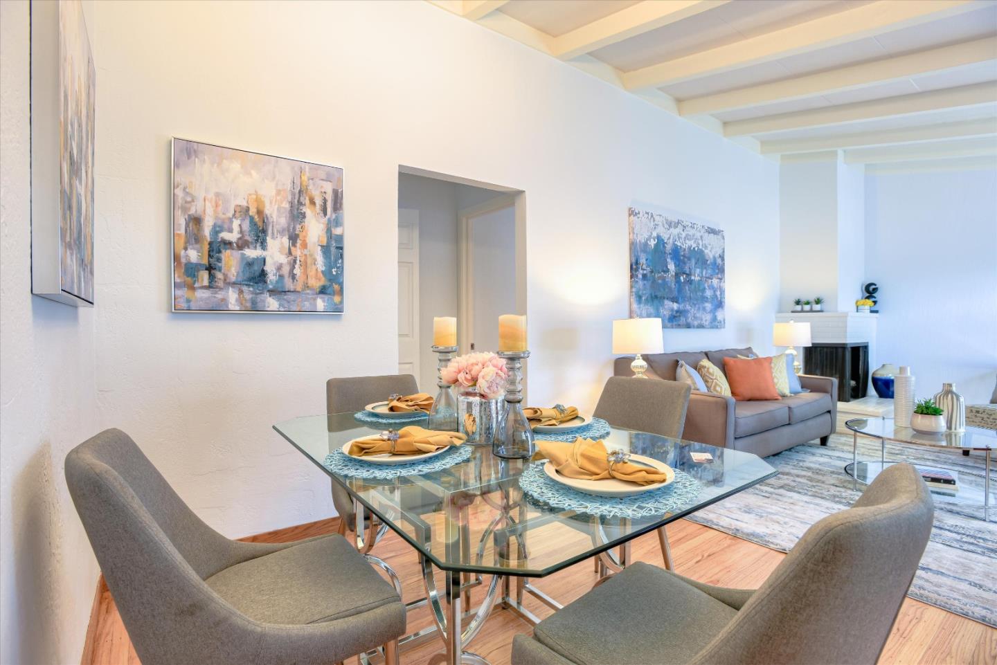 1619 Echo Avenue San Mateo, CA 94401 - Photo 15 of 34 a dining room with furniture and a painting