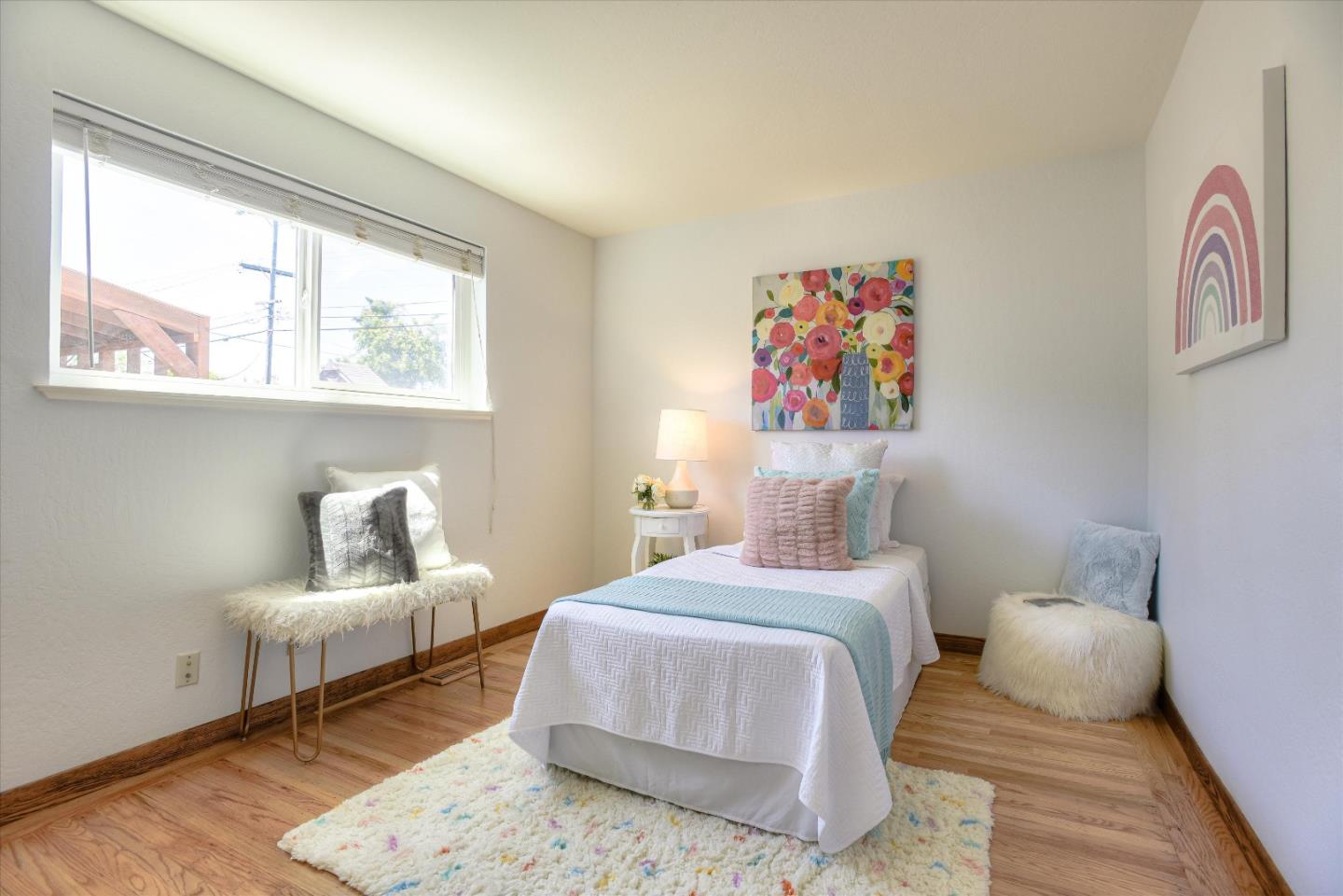 1619 Echo Avenue San Mateo, CA 94401 - Photo 21 of 34 a bedroom with a bed and a couch