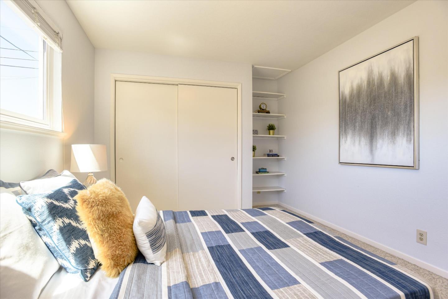 1619 Echo Avenue San Mateo, CA 94401 - Photo 24 of 34 a bedroom with a bed and a window