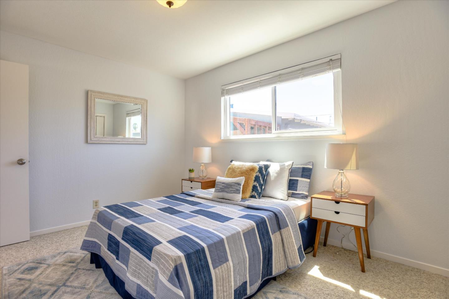 1619 Echo Avenue San Mateo, CA 94401 - Photo 26 of 34 a bedroom with a bed and a window