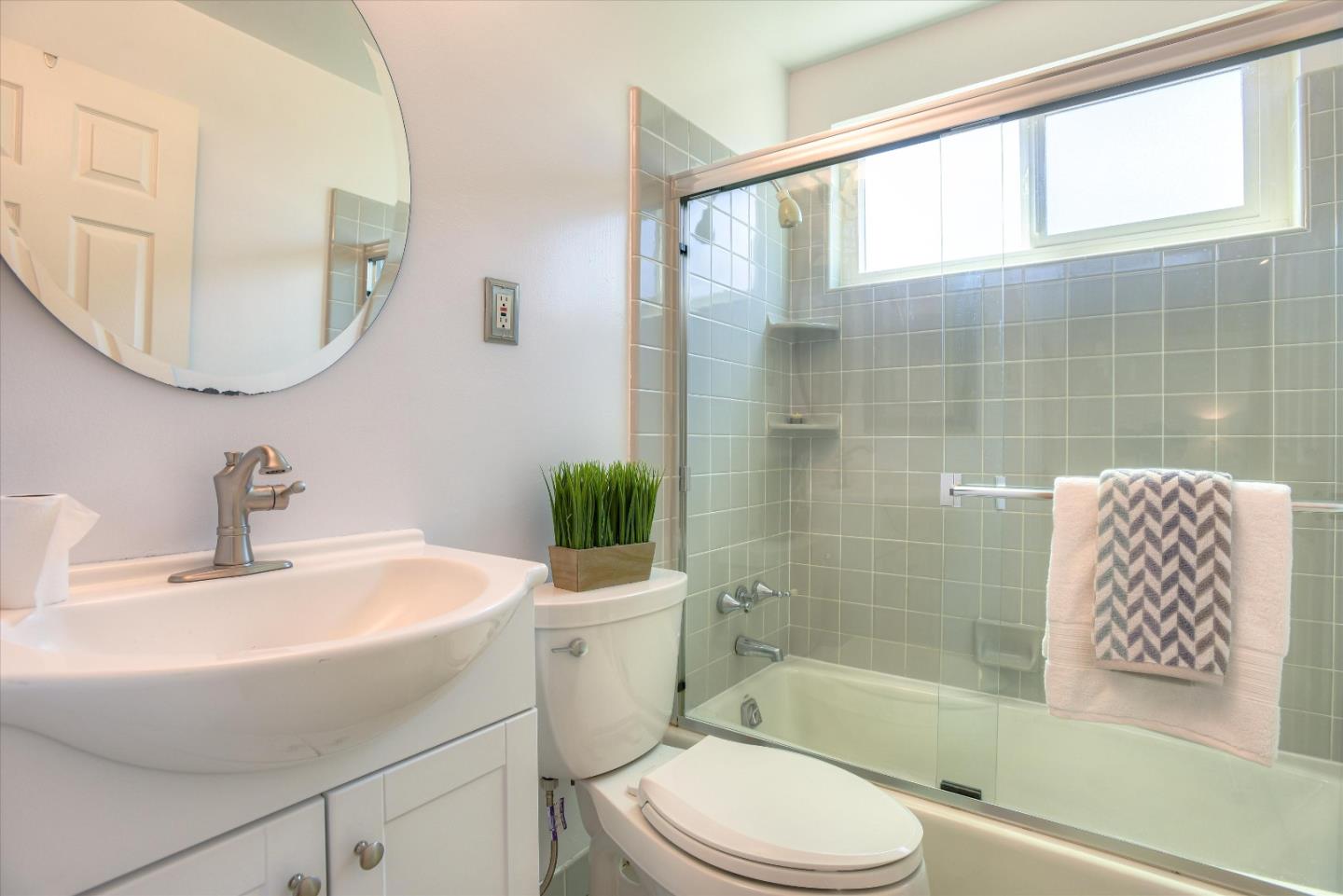 1619 Echo Avenue San Mateo, CA 94401 - Photo 27 of 34 a bathroom with a sink toilet and shower