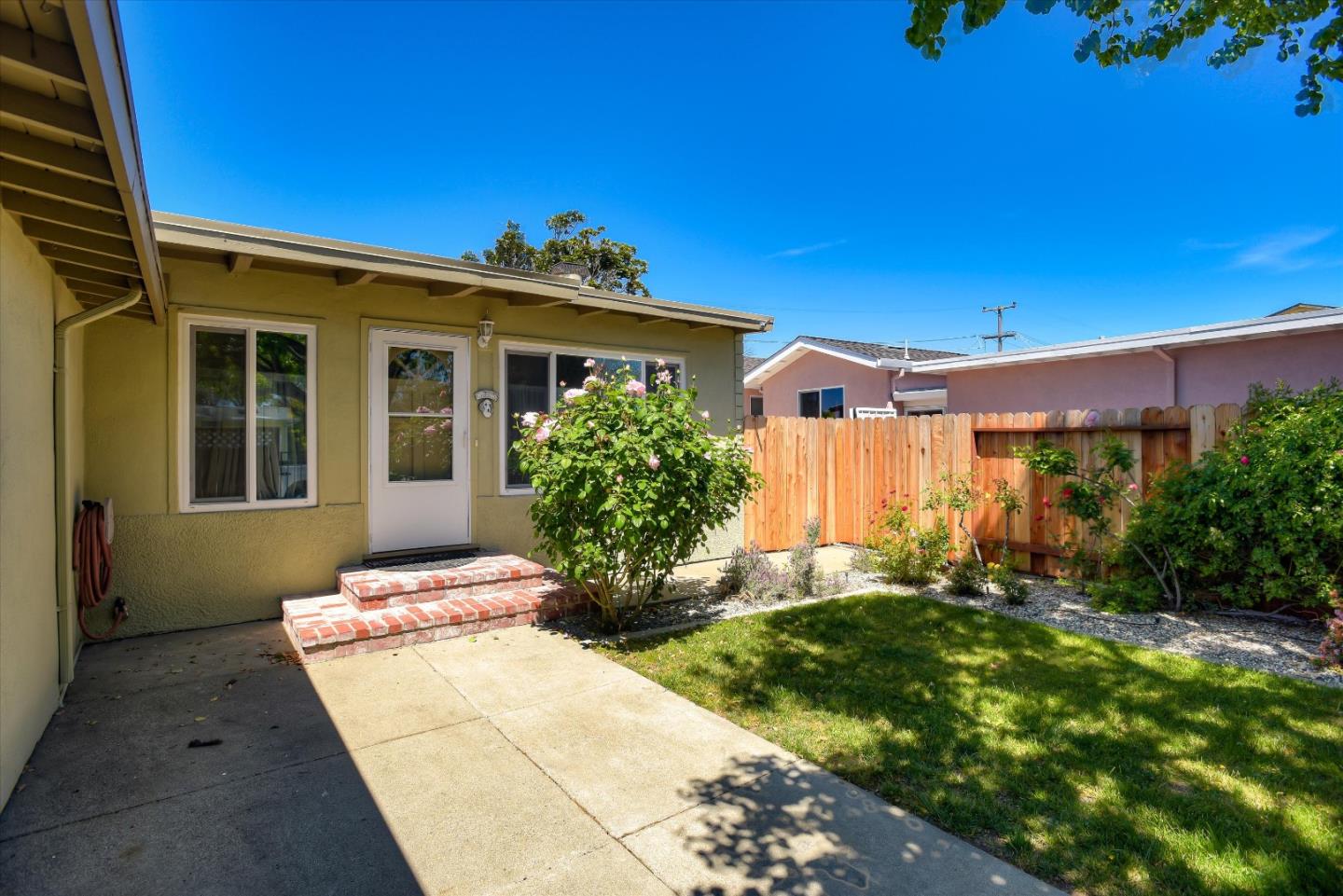 1619 Echo Avenue San Mateo, CA 94401 - Photo 3 of 34 a front view of house with yard